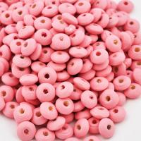 Koralik drewniany oponka 10 mm jasnoróżowy