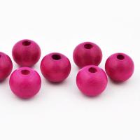 Koralik drewniany amarant 10 mm Koralik drewniany amarant 10 mm