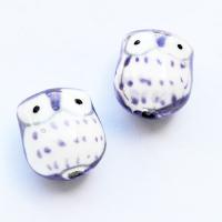 Sowa porcelanowa fioletowa