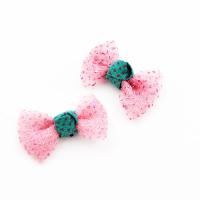 Kokardka pudrowy róż w kropki