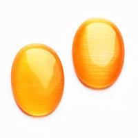 Kocie oko kaboszon 18 x 13 mm pomarańczowy Kocie oko kaboszon 18 x 13 mm pomarańczowy