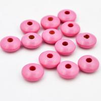 Koralik drewniany oponka 10 mm różowy CE Koralik drewniany oponka 10 mm różowy CE