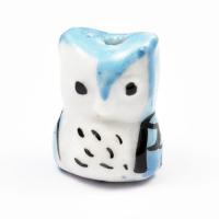 Sowa porcelanowa 17 x 14 mm jasnoniebieska Sowa porcelanowa 17 x 14 mm jasnoniebieska