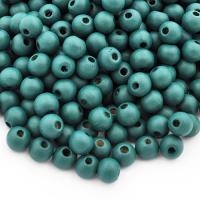 Koralik drewniany ciemnozielony 8 mm Koralik drewniany ciemnozielony 8 mm