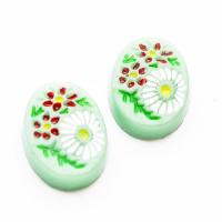 Kaboszon 18 x 13 mm seledynowy kwiatki